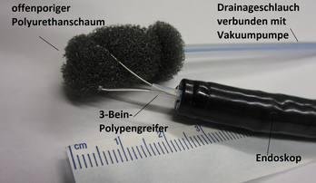 Grasping the openpore foam with a polyp-grasper