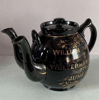 Large teapot with two spouts, dated 1905, possibly Jackfield Pottery