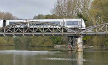 A trail Chiltern Railway's train crossing the Thames near Littlemore, Oxford on the Morris Cowley freight only branch line. November 2014. Photo: John Stretton/Rail Magazine.
