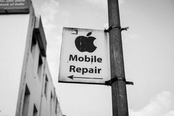 Mobile Repair, deutet auf eine iPhone Reparatur