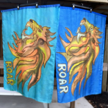 flags with fierce lions on them. Blue or turquoise background.