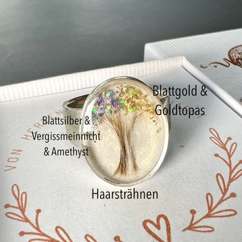 Silberring mit Haaren als Baum eingearbeitet