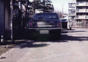 “Background #13” 2013, oil on photograph, 8.9×12.7cm