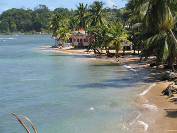 The beautiful village of Calibishie and its white sand beach