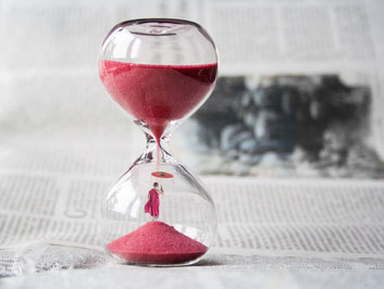 Hour glass showing time taking over raising stress levels. Giving time to de-stress