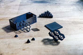 3D-printed RF/EMC absorber geometries—honeycomb, sheet, multi-scale square, made from FILAMAG-F filament