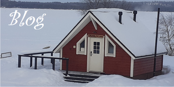 Inari-rood-huisje-sauna-meer-bevroren-ijs-sneeuw-Lapland-Finland