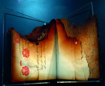 A fragment of a Stamping Register saved from the Custom House fire in 1921.
