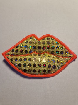 Kiss-Brosche – Golden & Glitzer mit Neonkante