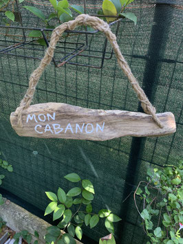 Panneau en bois flotté pour cabanon de jardin