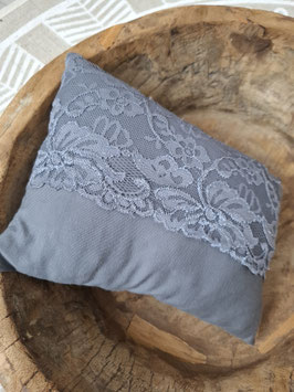 Gray pillow with lace