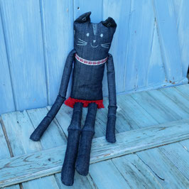 Grand doudou-chat noir en jupette rouge