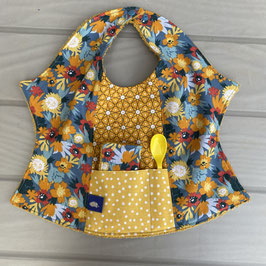 Bavoir papillon bleu imprimé de fleurs oranges jaunes et rouges