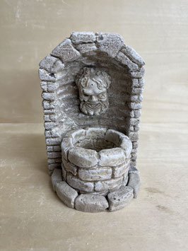 Brunnen im Steingewölbe