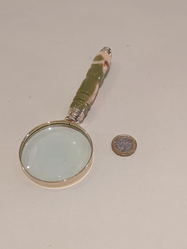 155. Gilt and acrylic magnifying glass.