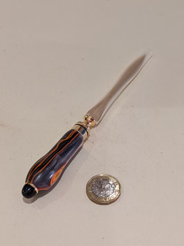 123. Stunning wood and gilt letter opener.