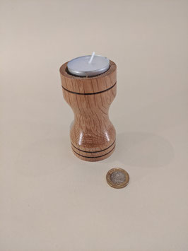 138. Hand-turned tealight holder in Oak.