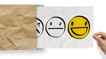 Mehrere Emojis. Das Erste lacht fröhlich, das Zweite ist neutral und das Dritte schaut bedröppelt.