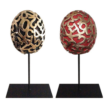 Paolo Grassi Eggs, twin bronze sculptures with numeric engravings on stands