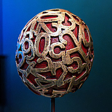 Paolo Grassi Eggs, twin bronze sculptures with numeric engravings on stands