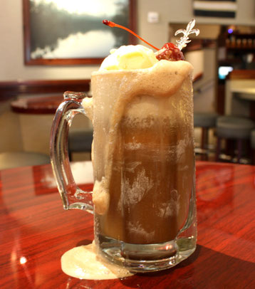 We have a birthday in the house and this week we are posting one of the birthday boy's favorite drinks the All-American Root Beer Float!