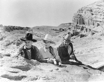 John Wayne and his fellow Mesquiteers on location in Red Rock Canyon: this scene of "Pals of the Saddle" was shot just to the left of CA-14 cutting through Red Rock Canyon State Park.