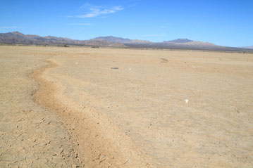 John Ford shot the scenes of the cavalary coming to the rescue of the "Stagecoach" on the ride side of the road that leads through Lucerne Dry Lake. The camera is pointing north, with the San Bernardino Mountains in the background.