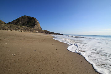 The beach at Point Mugu, with Mugu Rock on the far end, was used in two John Wayne movies: "North to Alaska" and "The Green Berets". 