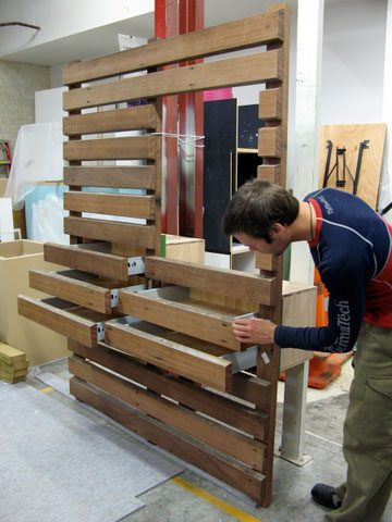 In the workshop with the wooden frame.