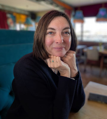 Lorraine Williams sitting in the Royal Harbour Brasserie in Ramsgate, smiling