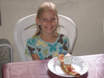 Emily turns 8 on Dec 3rd. But since we're traveling, we celebrated early. We had crepes with cream cheese filling.
