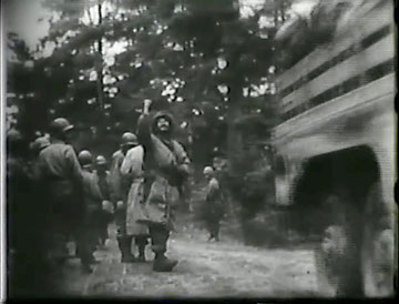 31 October 1944. Higgins is waving goodbye to his men as they head to the rear area near Lepanges, for two days rest and replacement training (courtesy Higgins Family Collection)