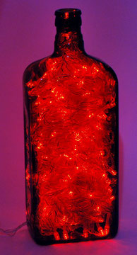 LL4 - vista frontale accesa - lampada decorativa con luci a led ad intermittenza, base cromatica rossa