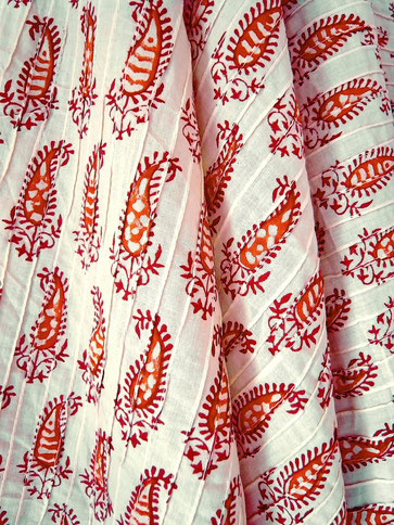 Cream, pinched pleat, Indian cotton throw with rust brown paisley block print; emroidered green, orange, village women border