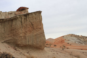 The Three Mesquiteers were hiding behind this rock in Hagen Canyon in Red Rock State Park to free John Wayne in "Pals of the Saddle".