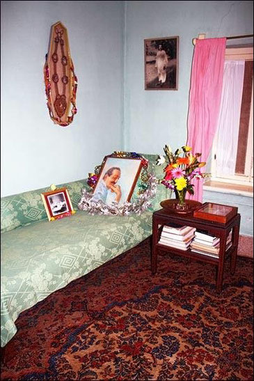 BABA'S Gadi in the corner of the sitting room in Meherazad