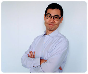 Dr. Ban, Director of Dr. Ban Chiropractic, providing a consultation.