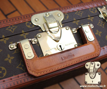 The suitcases (Bisten, Cotteville, Alzer) are fitted with a new square-shaped leather handle.   This is massive, hand-stitched, and held in place by two brass plates with large rivets.   Inscription on the front of the handle: L.Vuitton