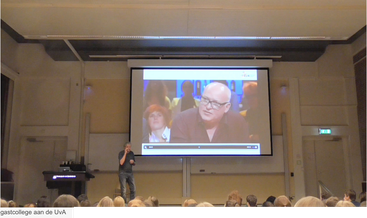 Gerard Stokkink tijdens een lezing op de UvA Faculteiten Psychologie en Sociale Wetenschappen