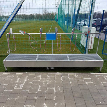 Washing station for football boots with hand washing brushes