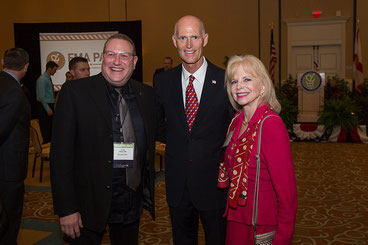 Drs. Aaron Elkins and Dana Wallace with Governor Scott