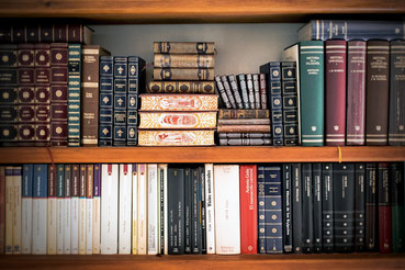 book shelf with books for homeschooling