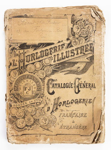 Die Titelseite des Uhrenkataloges. Der Katalog einthält die gesamte Bandbreite es Angebotes an Uhren. Stand-, Wand-, Tisch-, und Taschenuhren