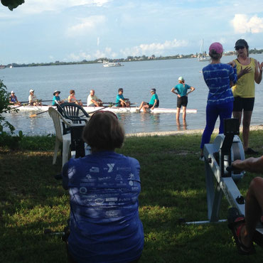 view from behind the ergs of a departing sweep eight