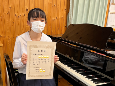 画像：令和4年度 福井市至民中学校　合唱コンクール  最優秀伴奏者賞　Yちゃん（中3）