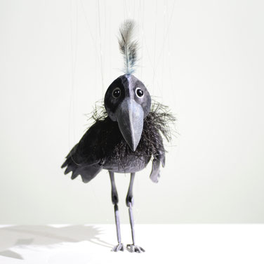 Marionette weiser Rabe
