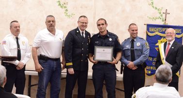 l to r: Assistant Chief Dave Zawodniak, Chief John Piccola, Assistant Chief Steve Szanto, FF Tony Grasso, FF Dan Piccola, Grand Knight John McQuillan