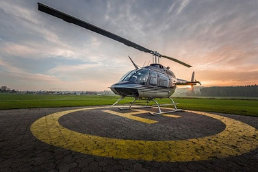 Elite Flights, Bell 206 Jet Ranger, HB-XXO, Tarmac  Abendstimmung, Helikopterflotte, Luzern-Beromünster, Grenchen