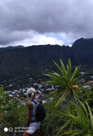 Reunion Island/Early summer: View from Dimitile Range down to the creole village of Entre Deux. Some menacing clouds which won't do any harm.
