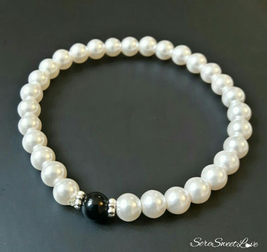 Bracciale di perle con "Su Coccu".
